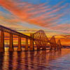 Vivid sunset over The Forth Bridges